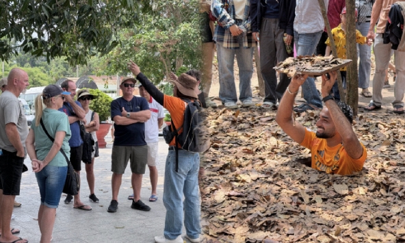 Khách Tây chăm chú nghe lịch sử tại Địa đạo Củ Chi ngày 30/4