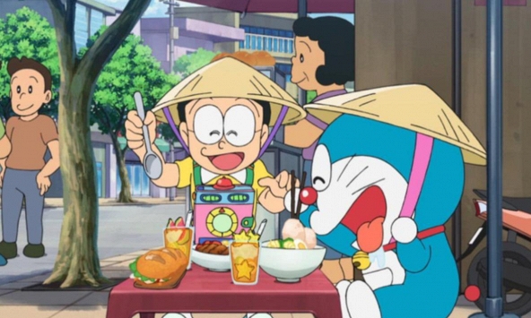 Đưa cảnh Nobita ngồi ghế nhựa ăn cơm tấm lên phim, ê-kíp Doraemon hé lộ nguyên nhân viết sai tên đặc sản Việt