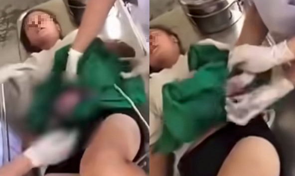 Clip sản phụ 'đẻ rơi' ngay trên xe máy đến bệnh viện