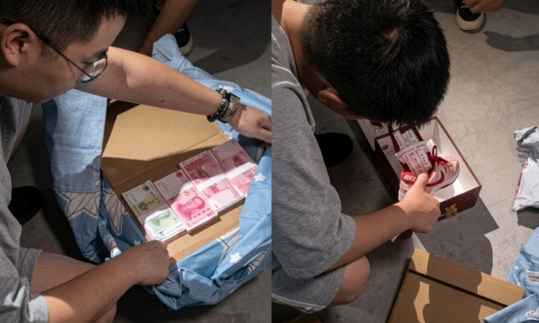 Nhận giao 2 kiện hàng, shipper lập tức báo công an: Phát hiện 148 triệu đồng tiền mặt, 1 thỏi vàng 32,26 gram