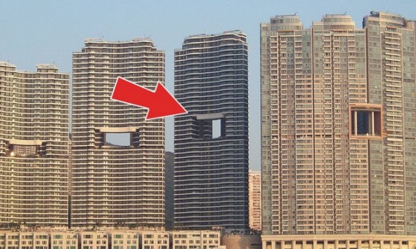 Tại sao các toà nhà ở Hong Kong luôn có lỗ thủng ở giữa?